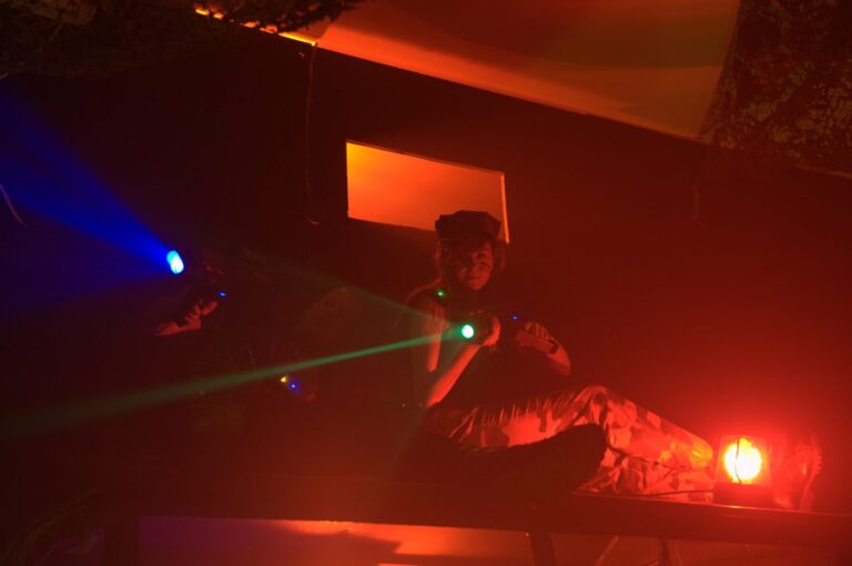 Laser tag for hen party. Players in a laser tag arena.