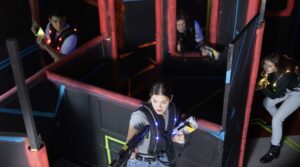 Laser tag for group event. A team of players playing laser tag.