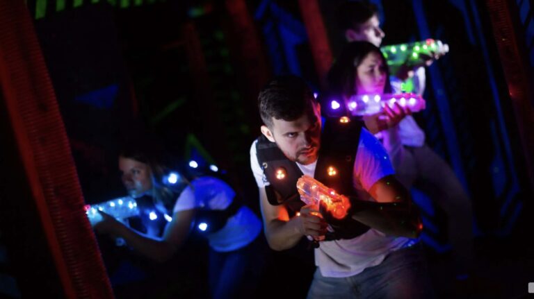Laser tag for group event. Team of laser tag players in their gear.