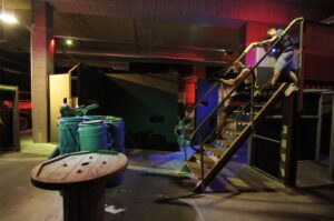 A group plays laser tag for a corporate event.